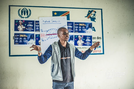 Medi talking to the class